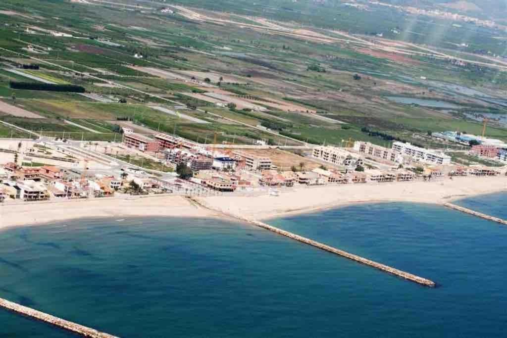 דירות פוזול Apto Con Piscina En La Playa Cerca De Vlc Con Ac מראה חיצוני תמונה